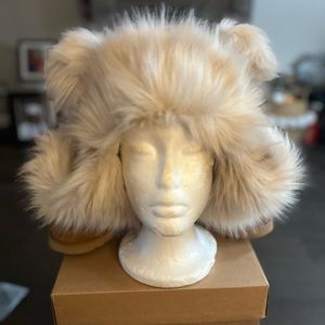 Ugg faux fur hat.